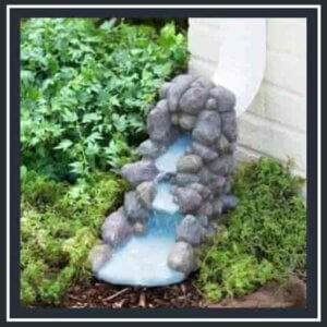 Decorative Rock Waterfall Downspout Extension